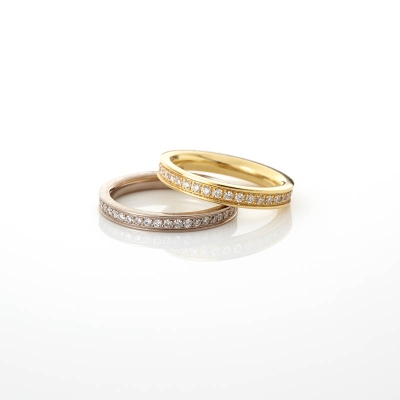 ​​​​Memoire-Ringe in 750/- Weiß- und Gelbgold mit umlaufenden Brillanten